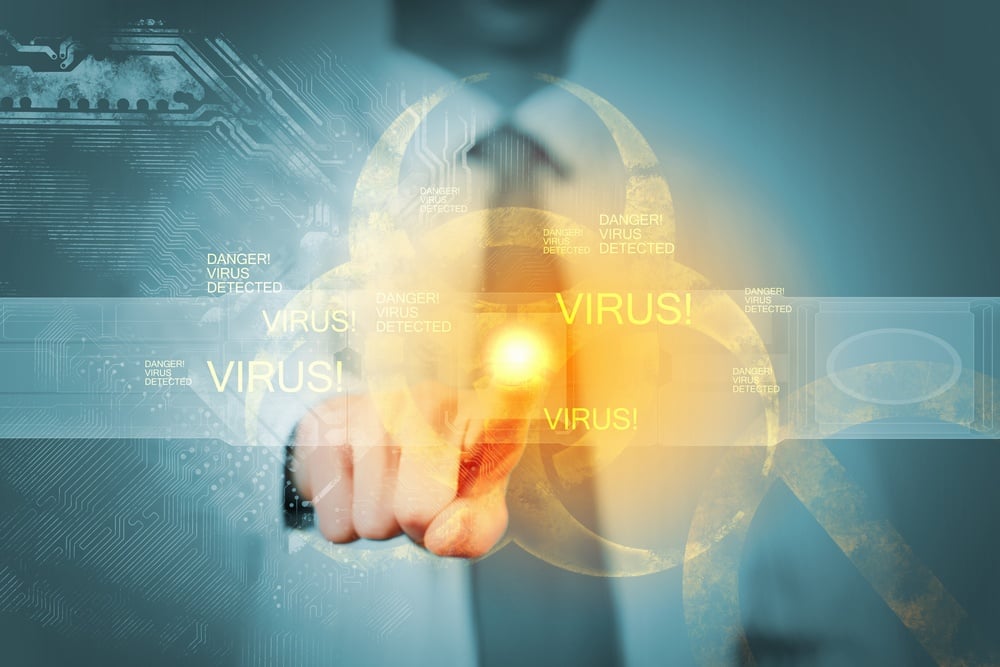 Image of businessman touching virus alert icon